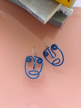 Samuel Coraux earring abstract head